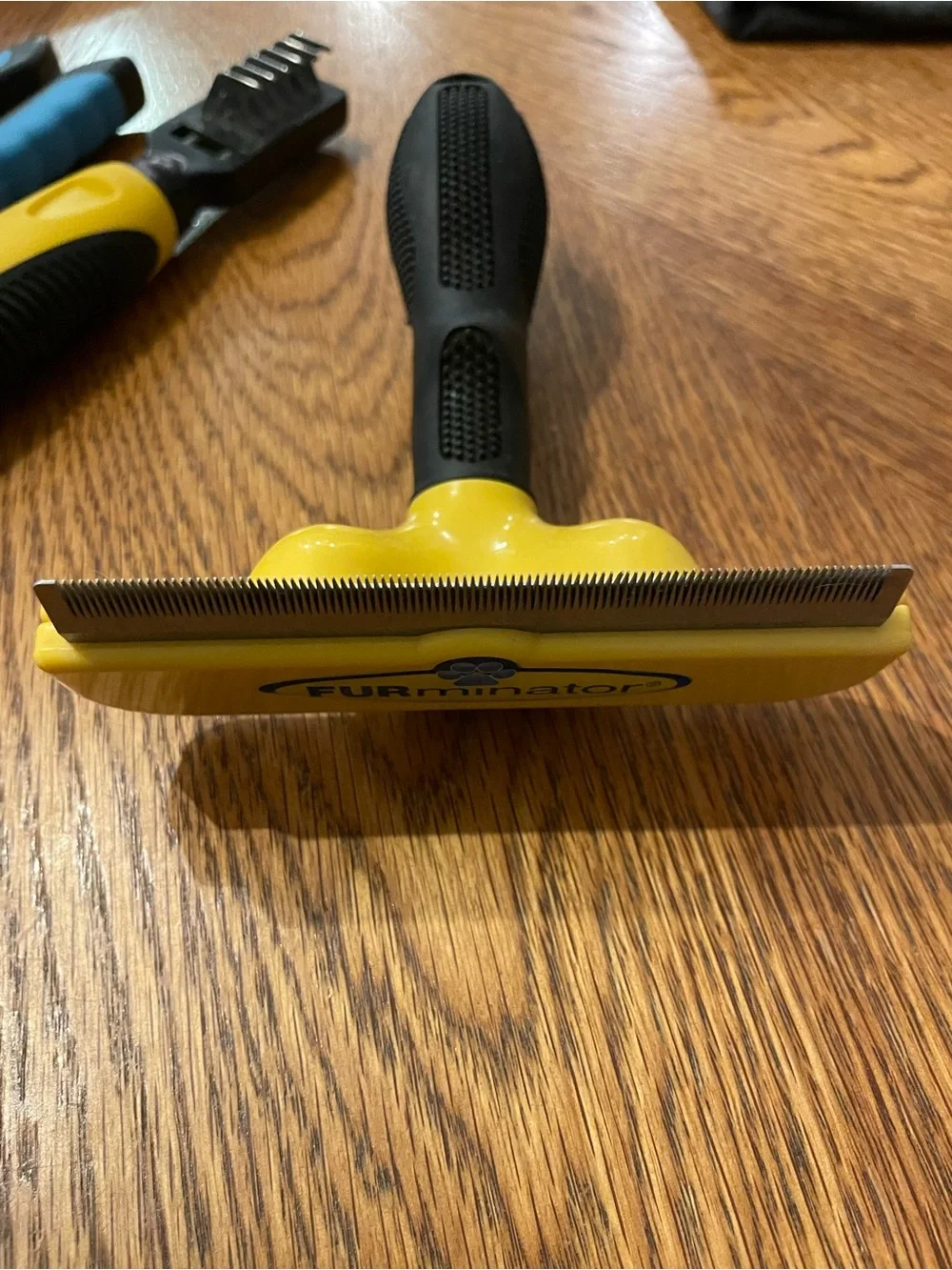 FURminator Yellow and Black Deshedding Tool with Blue-Accented Nail Clippers